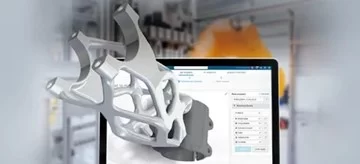 A generatively designed metal part displayed on a computer screen within the 3DEXPERIENCE platform, with a factory environment in the background.