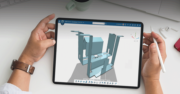 A person holding a tablet displaying a 3D model in the 3DEXPERIENCE platform.